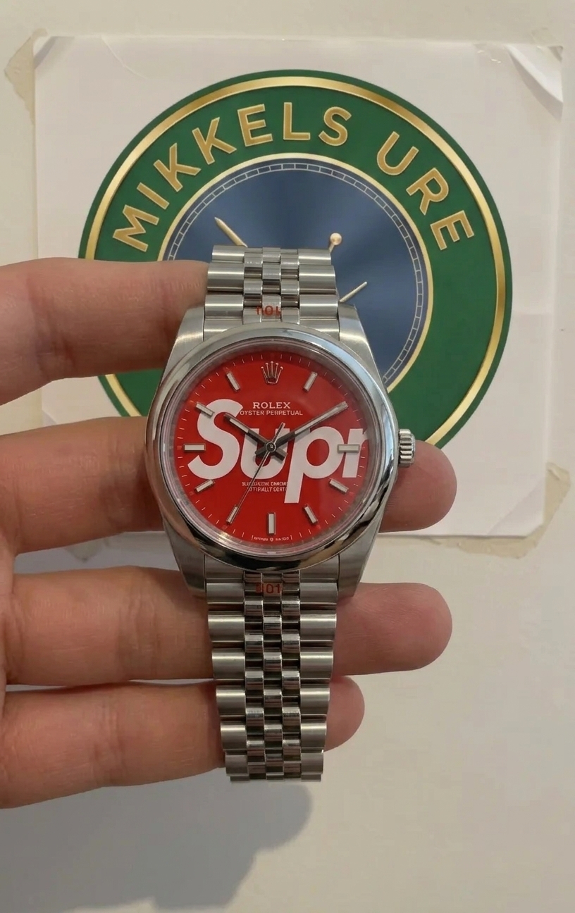 Rolex Oyster Perpetual Supreme Red Dial